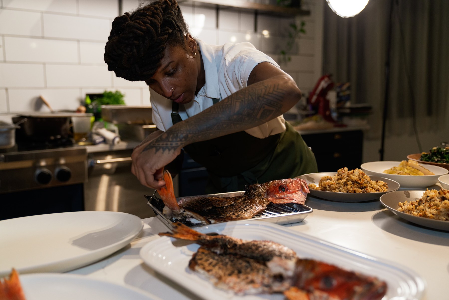 Chef Mariya plating whole fish