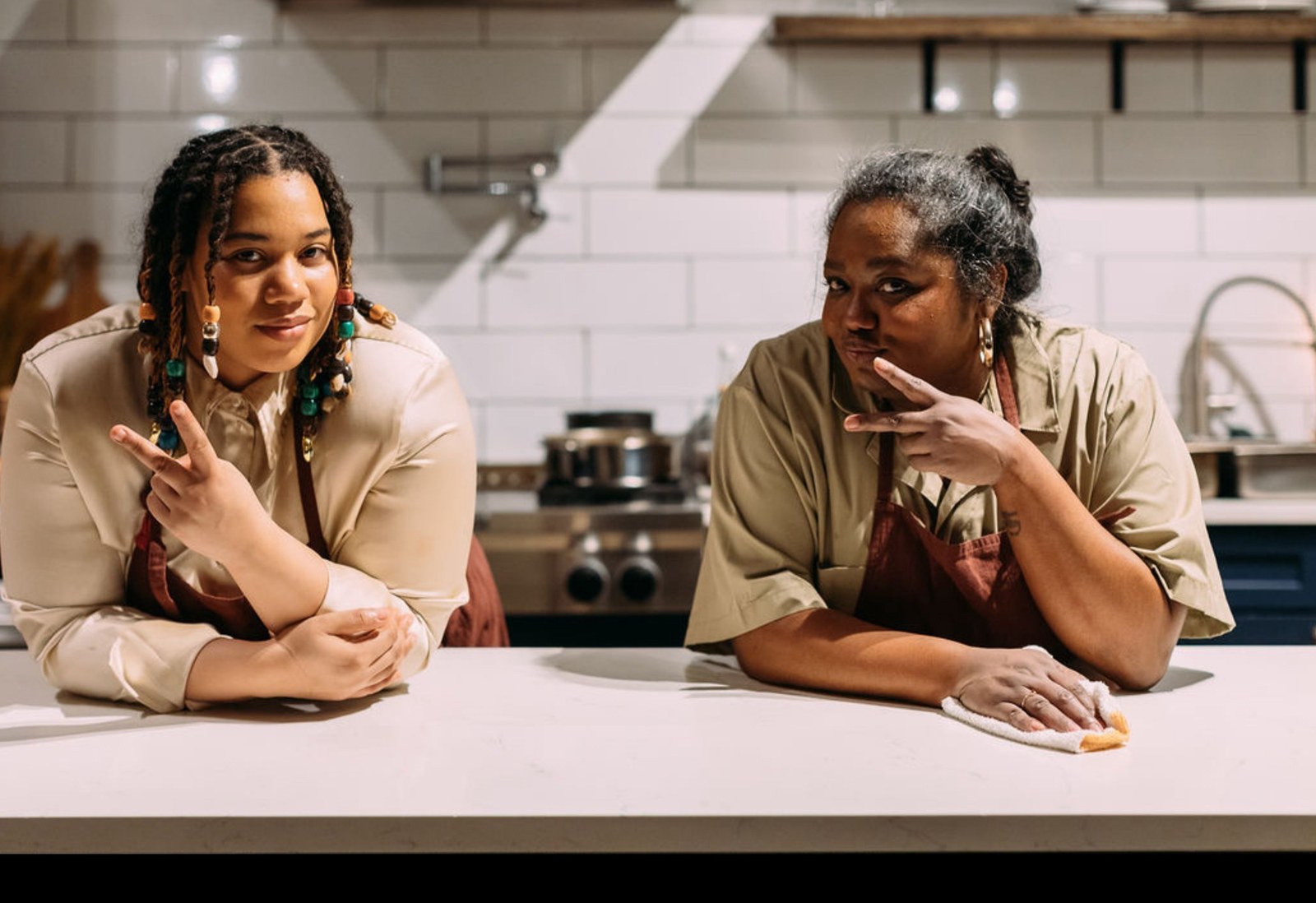 Two members of the Connie's Underground team in the kitchen